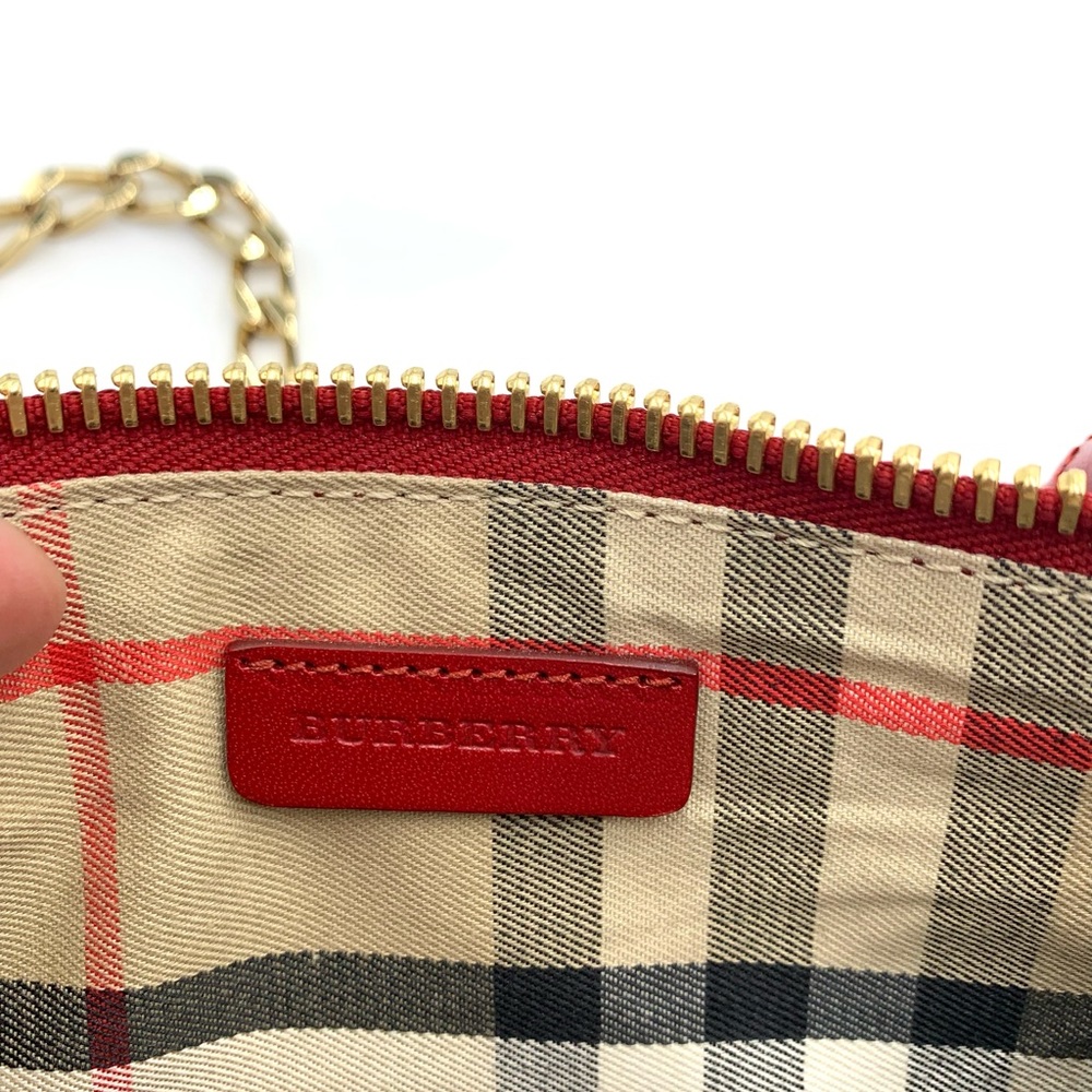 Auth Burberry Peyton Crossbody Clutch with Tassel in Rich Cranberry Red. $485 - Picture 11 of 13